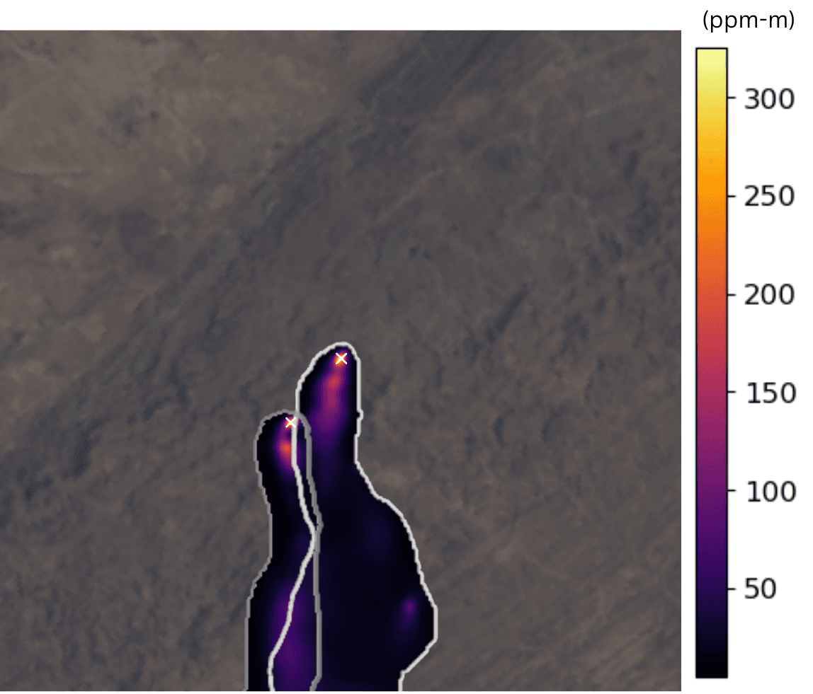Satellite map overlay showing two concentrated emission plumes radiating from sources marked with an 'X'.