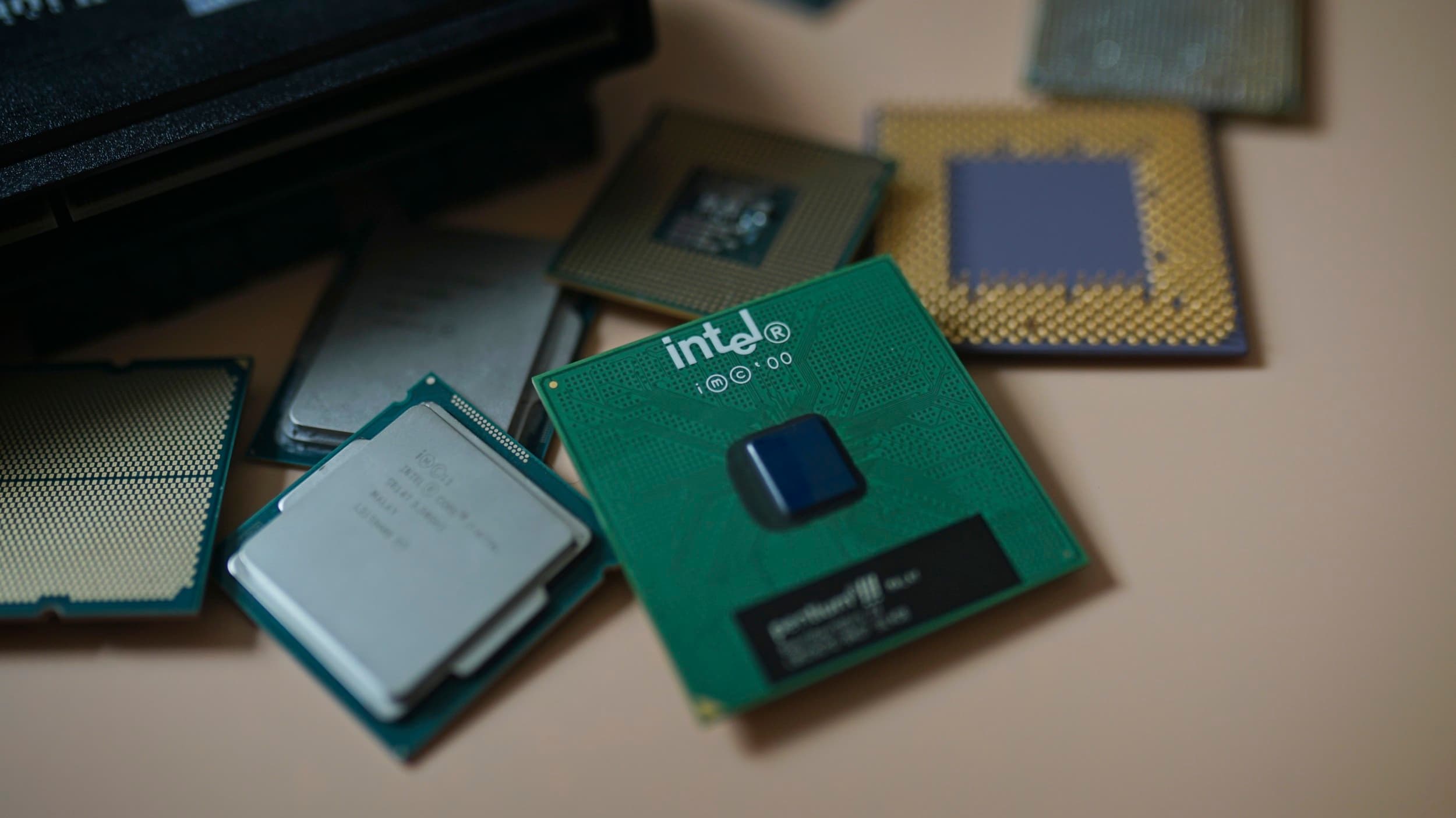 An Intel CPU sitting among other CPUs.
