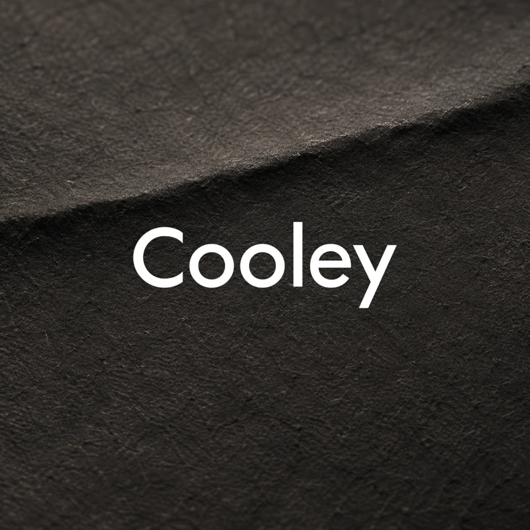 Cooley logo over a dark pressed paper texture.