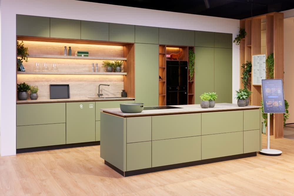 Key products on display include the Extractor Induction Hob, the Bespoke AI Dishwasher, refrigerators and the Bespoke AI Oven.