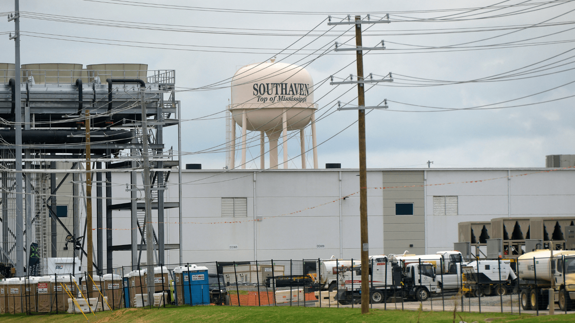 a water tank in Southaven, Mississippi, with the SpaceXSI data center in the foreground