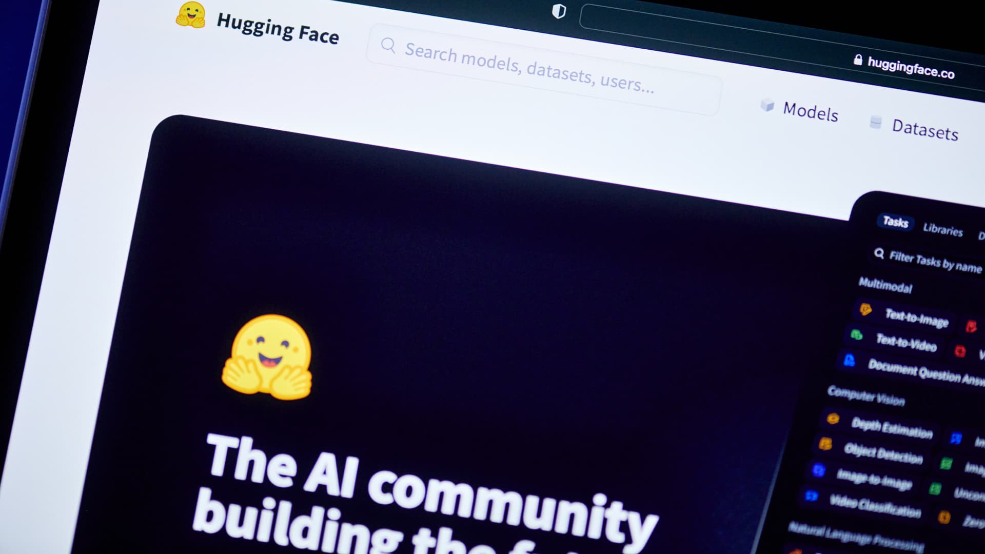The Hugging Face website on a laptop