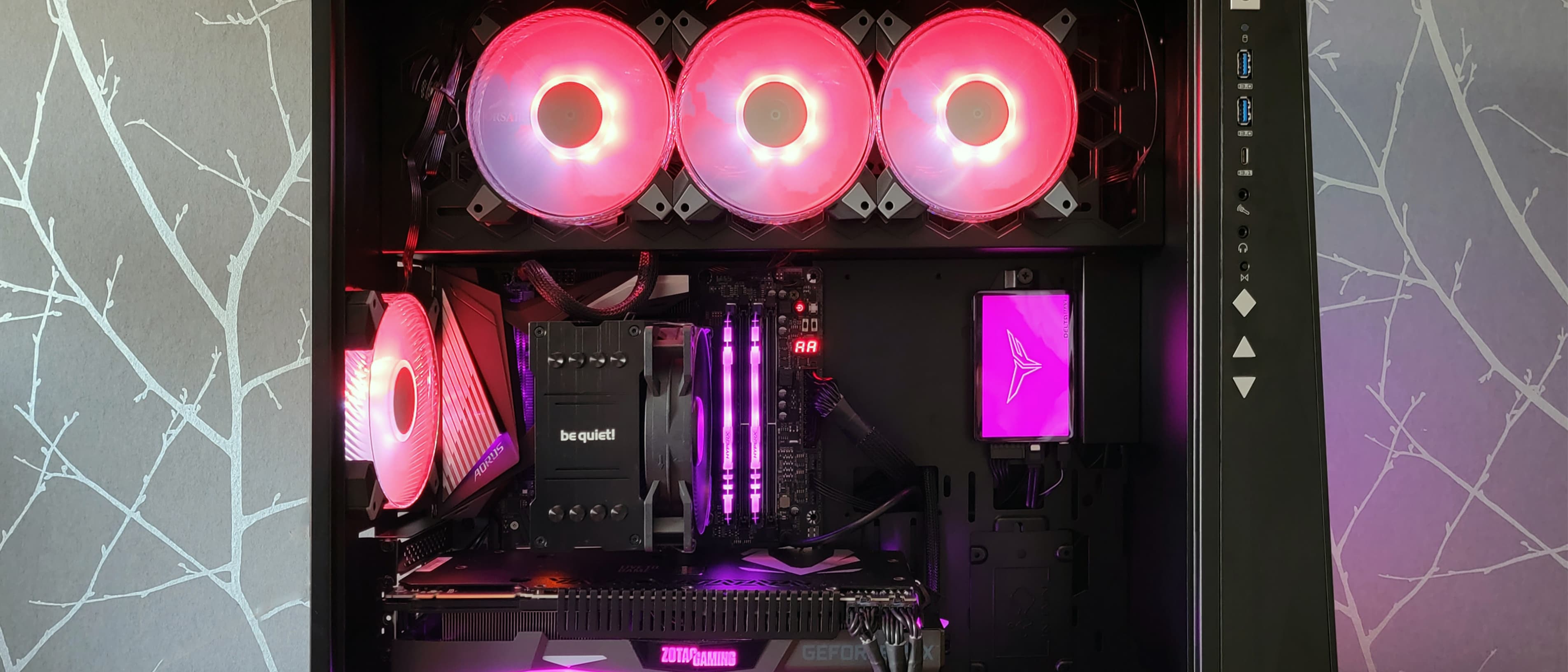 A closeup of a PC build with lots of RGB lighting in an In Win PC case, this is an example of the kind of PC build you could put together if you're out of the budget realm.