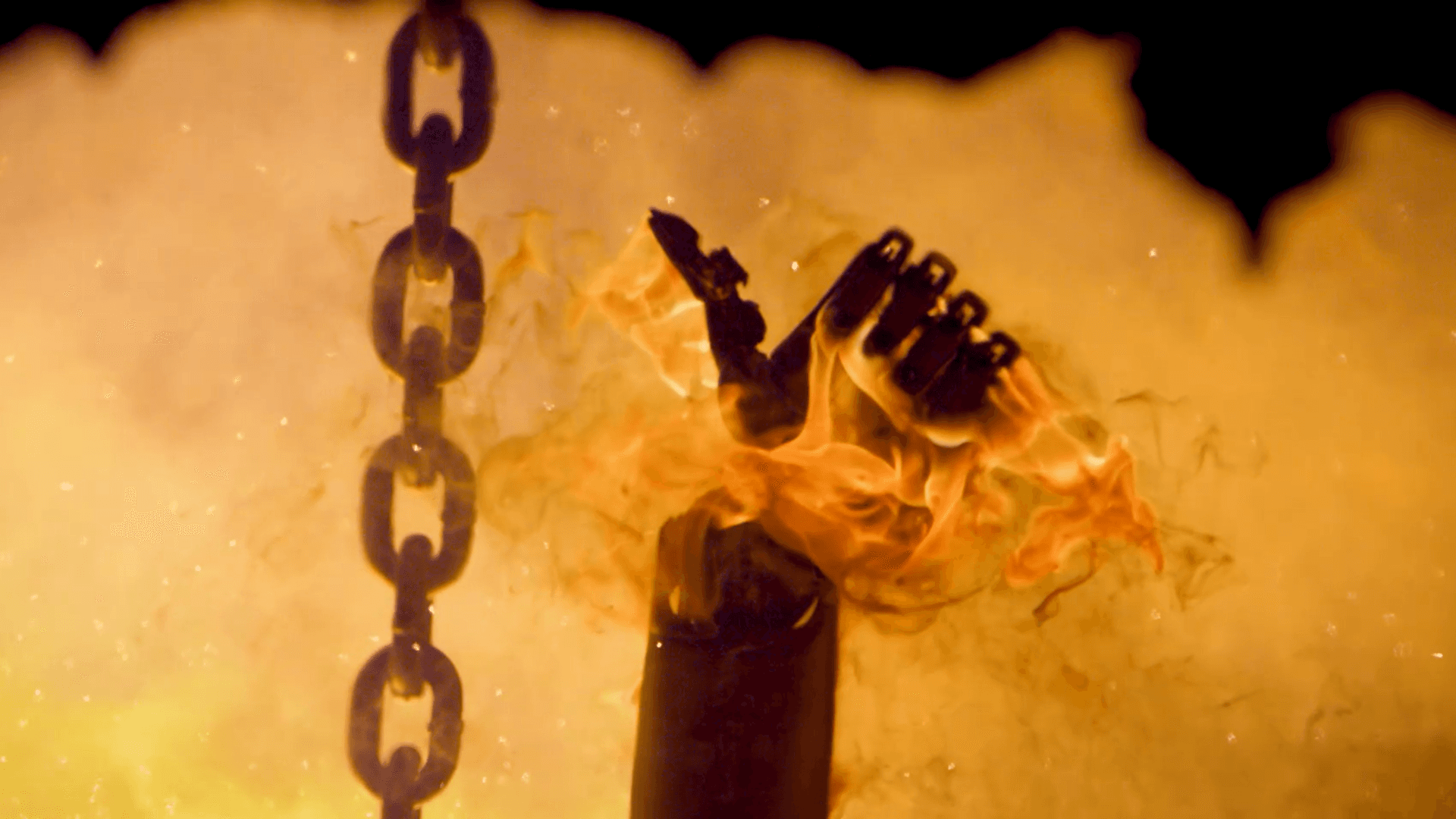 an F.02 robot being melted in molten steel showing a thumbs up sign